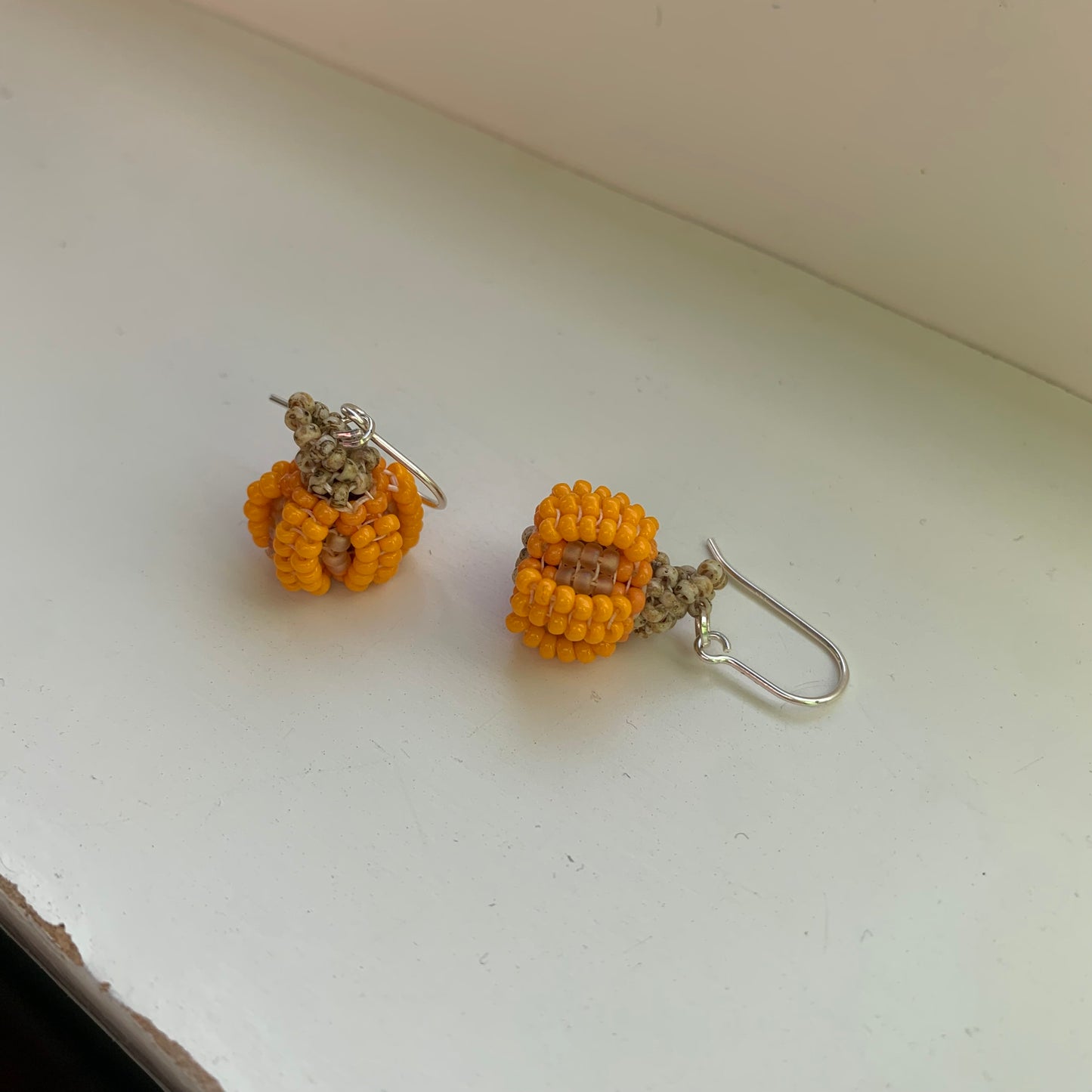Örhängen PUMPA orange/transparent